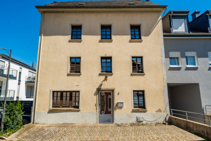 Grande maison de 5/6 chambres avec jardin.